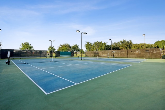 view of tennis court with basketball court