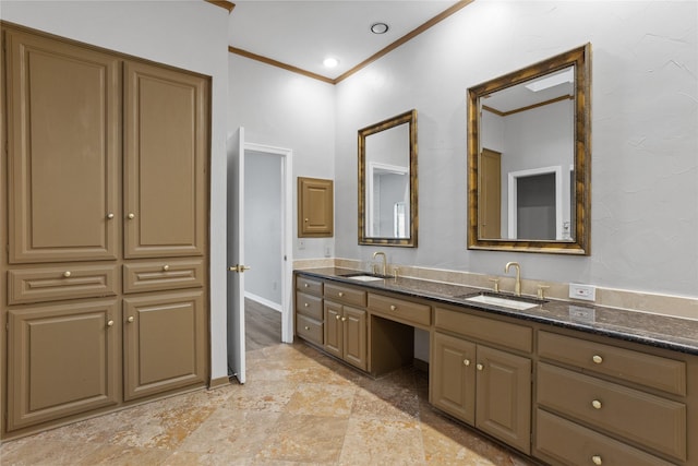 bathroom featuring vanity and ornamental molding