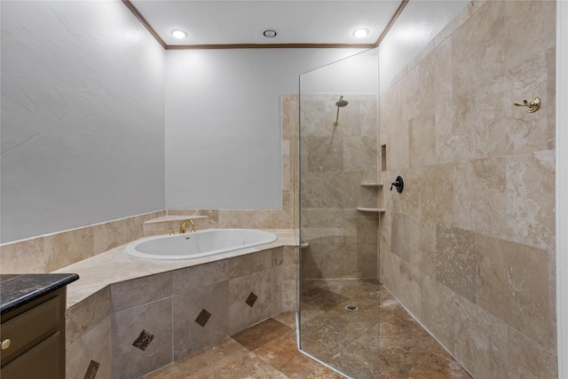 bathroom featuring vanity and shower with separate bathtub