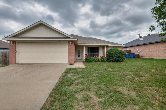 ranch-style home featuring an attached garage, driveway, a front lawn, and brick siding