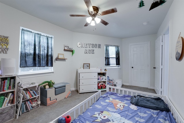 bedroom featuring ceiling fan and carpet floors