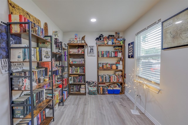 109 W Purdom Ave, Alvarado, TX 76009 - miscellaneous room with wood finished floors, baseboards, and recessed lighting