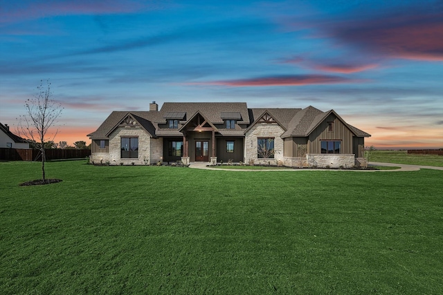 craftsman inspired home featuring a yard