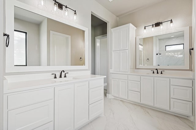 bathroom featuring vanity, a healthy amount of sunlight, and walk in shower