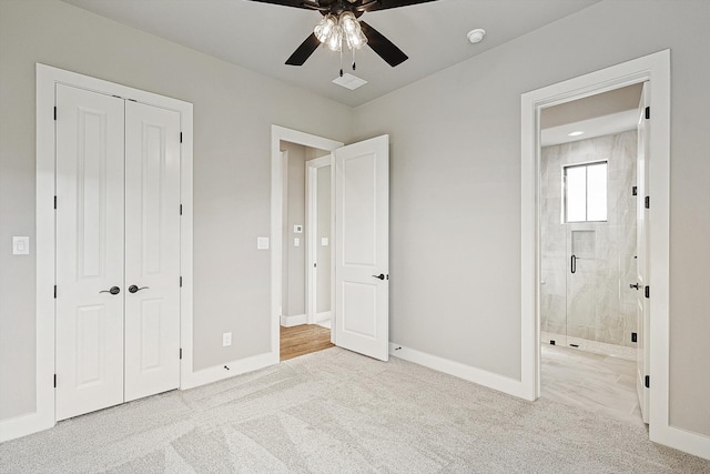 unfurnished bedroom featuring a closet, light carpet, and ceiling fan