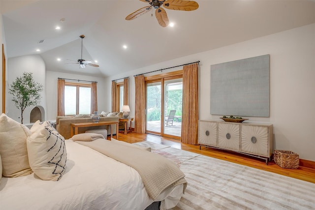 bedroom with vaulted ceiling, ceiling fan, light hardwood / wood-style floors, and access to outside