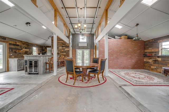 dining space with plenty of natural light and concrete floors