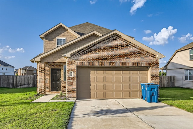 view of front of property with a garage and a front yard