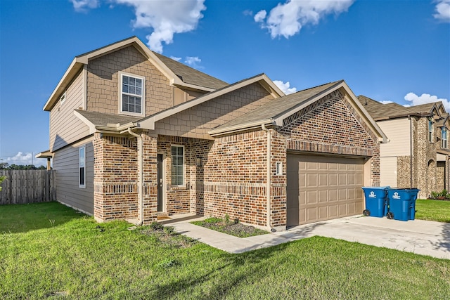 view of front of property featuring a garage and a front lawn