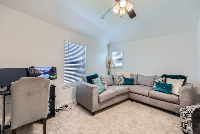 carpeted living room featuring plenty of natural light and ceiling fan