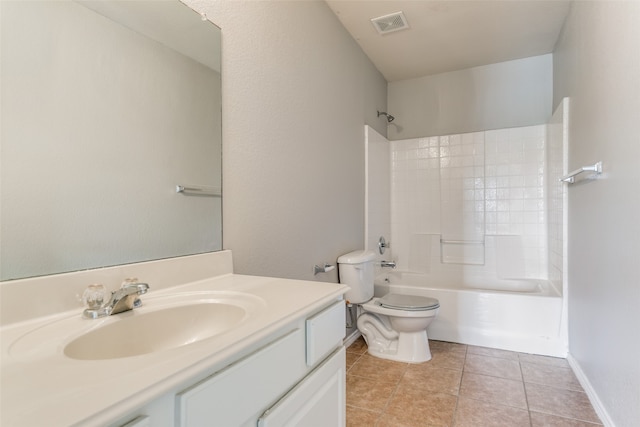 full bathroom featuring tile patterned flooring, shower / bath combination, vanity, and toilet