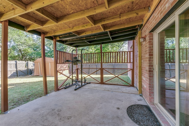 view of patio / terrace featuring a storage shed