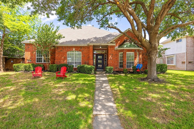 view of front of home with a front yard