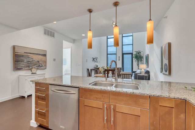 kitchen with a sink, visible vents, light stone countertops, and stainless steel dishwasher