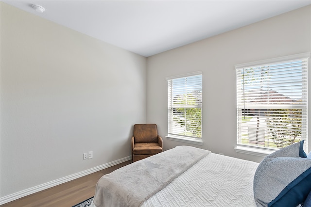 bedroom featuring hardwood / wood-style floors