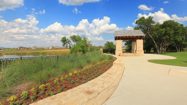 view of property's community with a water view