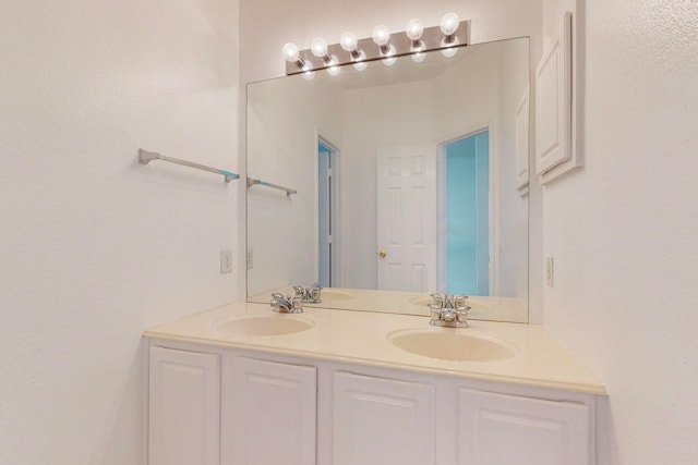 bathroom with double sink vanity