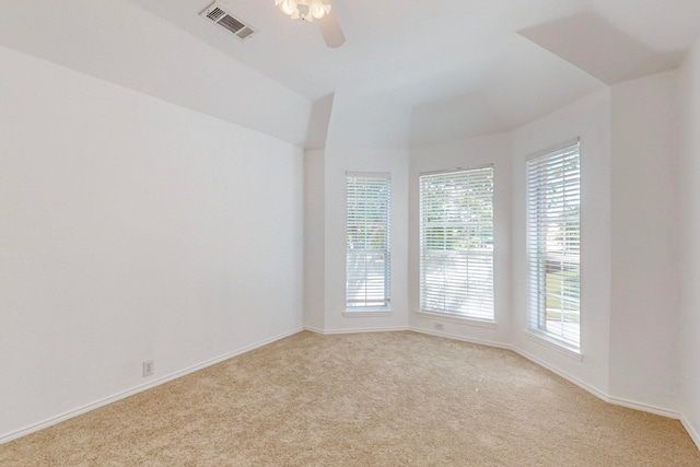 empty room with light carpet and ceiling fan