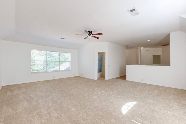 carpeted empty room with ceiling fan