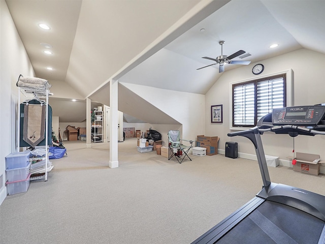 workout area featuring carpet flooring, ceiling fan, and lofted ceiling