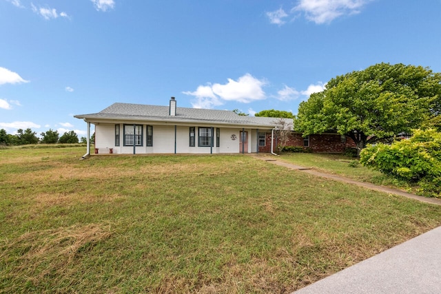 ranch-style house with a front yard