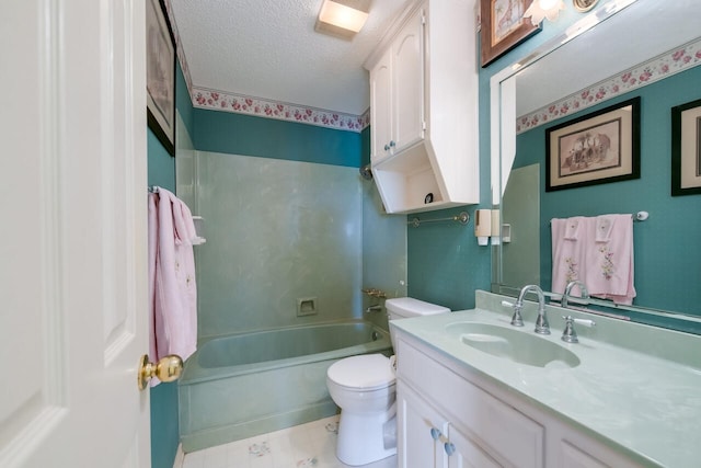 full bathroom with a textured ceiling, washtub / shower combination, tile floors, vanity, and toilet