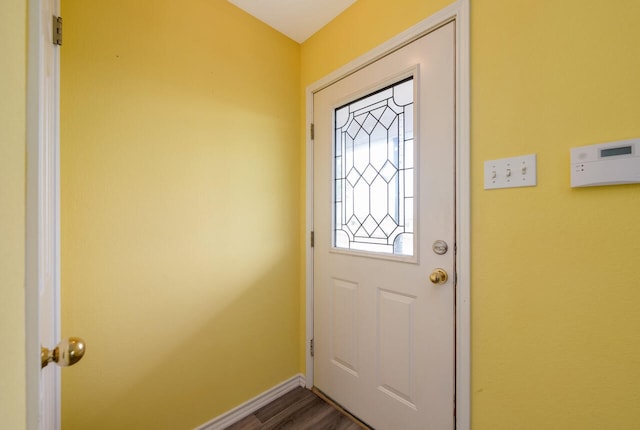 entryway with hardwood / wood-style floors