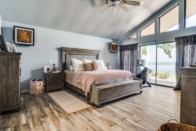 bedroom featuring ceiling fan, high vaulted ceiling, access to exterior, and light hardwood / wood-style floors