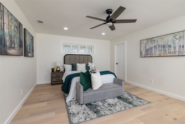 bedroom featuring ceiling fan and light wood-type flooring