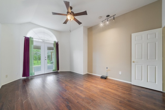 empty room with french doors, dark hardwood / wood-style floors, ceiling fan, and lofted ceiling