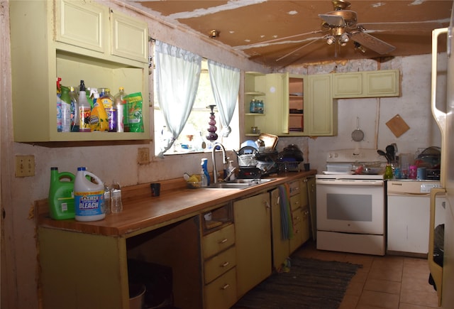 kitchen with sink, ceiling fan, light tile patterned flooring, and white electric range oven