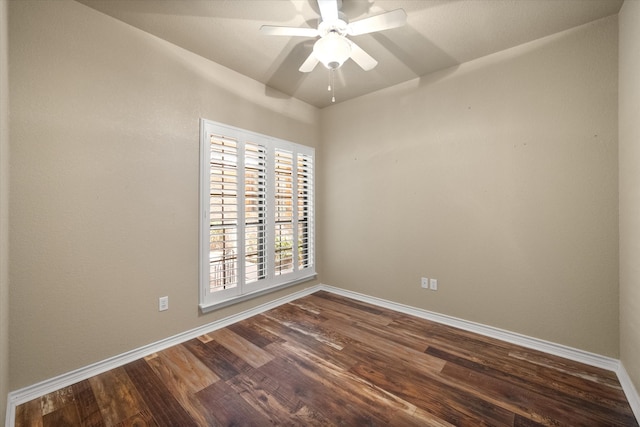 empty room with hardwood / wood-style floors, vaulted ceiling, and ceiling fan