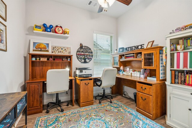 office area featuring light hardwood / wood-style floors and ceiling fan