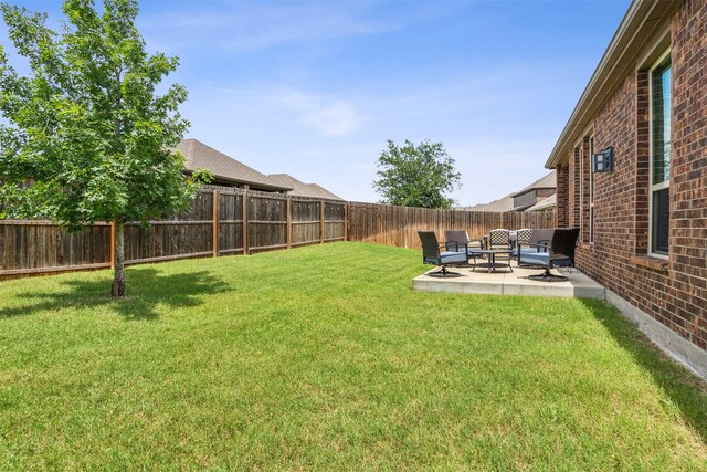 view of yard with a patio area