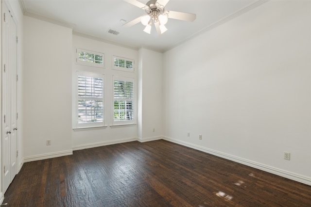 empty room with crown molding, ceiling fan, and dark hardwood / wood-style floors