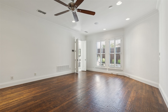 empty room with crown molding, ceiling fan, and dark hardwood / wood-style flooring