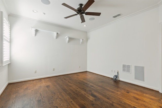 spare room featuring dark wood-type flooring, ceiling fan, and ornamental molding