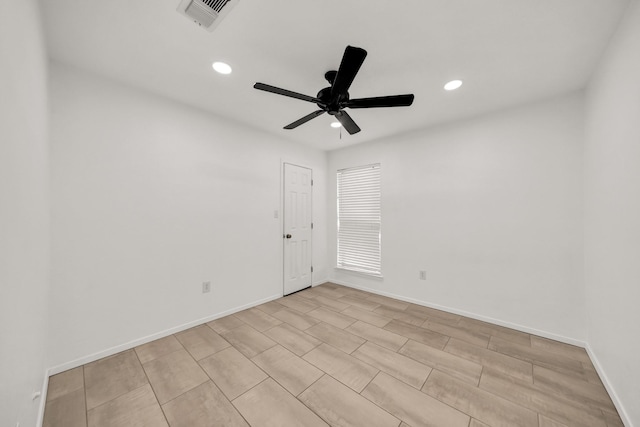 unfurnished room with ceiling fan