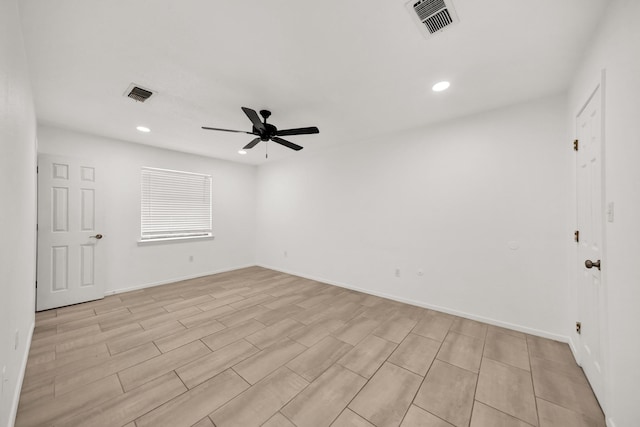 unfurnished room featuring ceiling fan