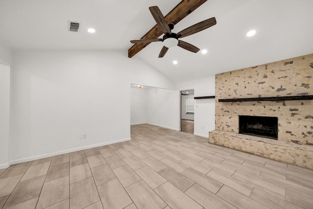 unfurnished living room featuring vaulted ceiling with beams, ceiling fan, and a large fireplace