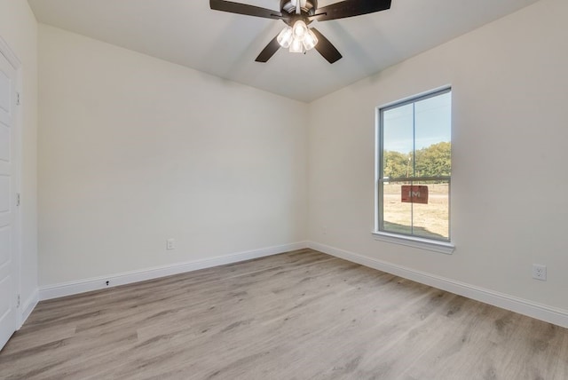 unfurnished room with light hardwood / wood-style floors and ceiling fan