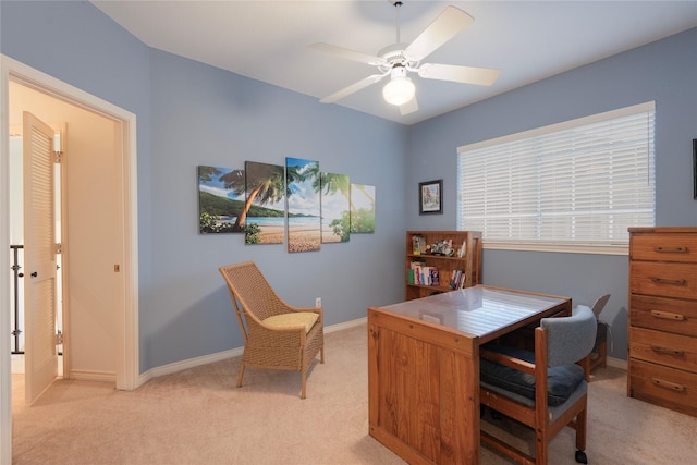 office area with ceiling fan and light colored carpet