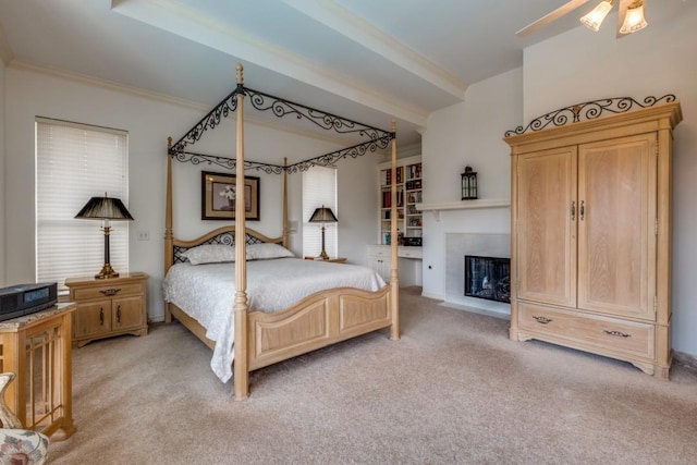 bedroom with ceiling fan, light colored carpet, and ornamental molding