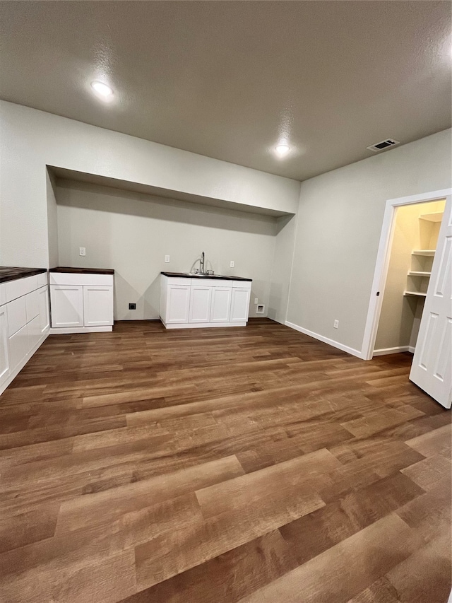 interior space with dark wood-type flooring