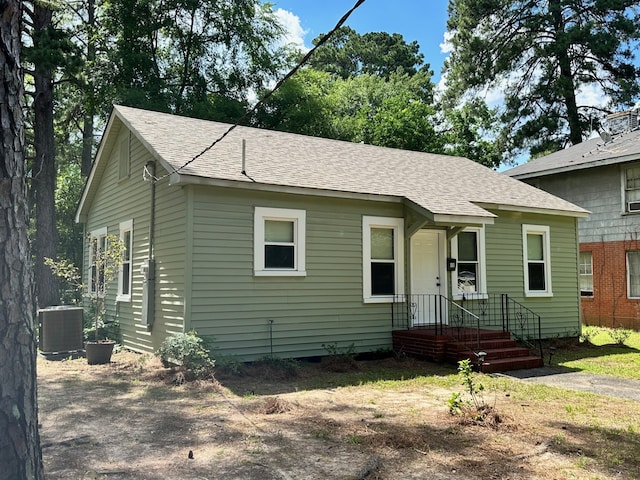 view of front of property with cooling unit