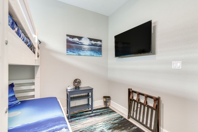 bedroom with light wood-type flooring