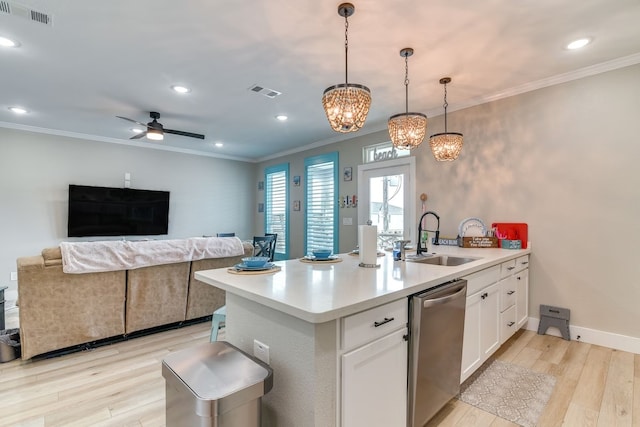 kitchen with ceiling fan with notable chandelier, white cabinetry, light wood-type flooring, sink, and pendant lighting