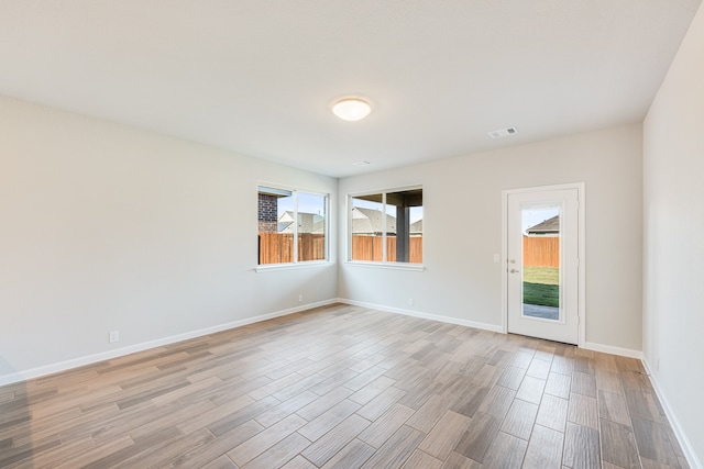 empty room featuring light hardwood / wood-style floors