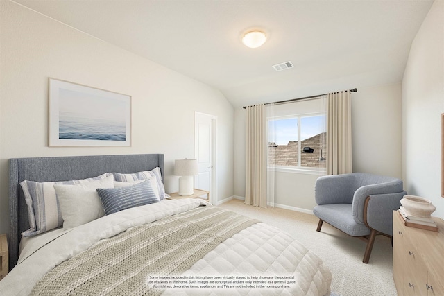 carpeted bedroom featuring vaulted ceiling