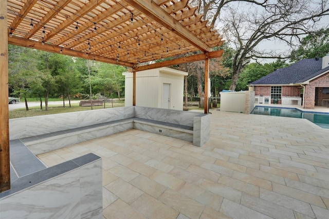 view of patio with a pergola and a storage unit